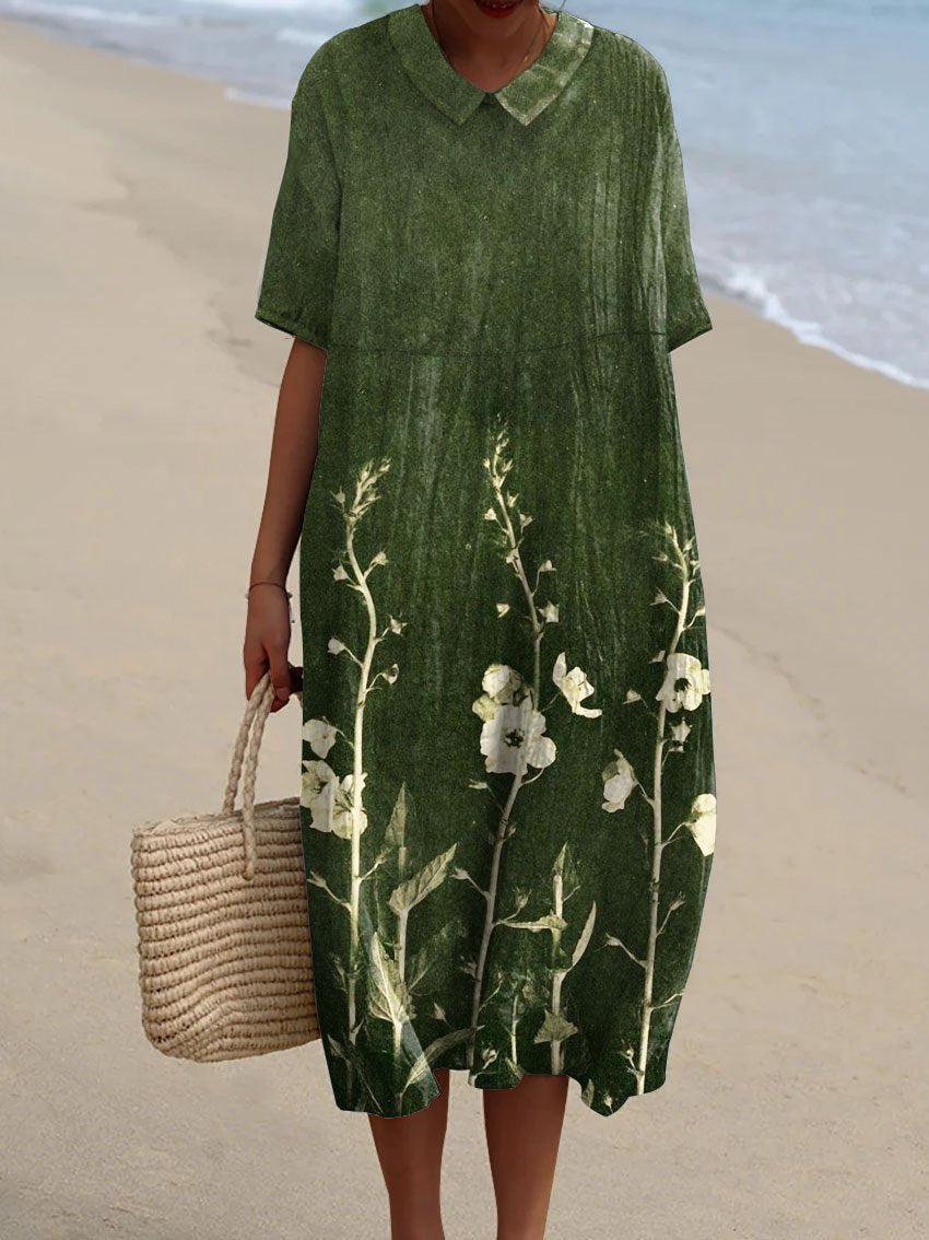 Damen Sommerkleid Talia mit modernem V-Ausschnitt & romantischem Blumenmuster. Bequem & stylisch.