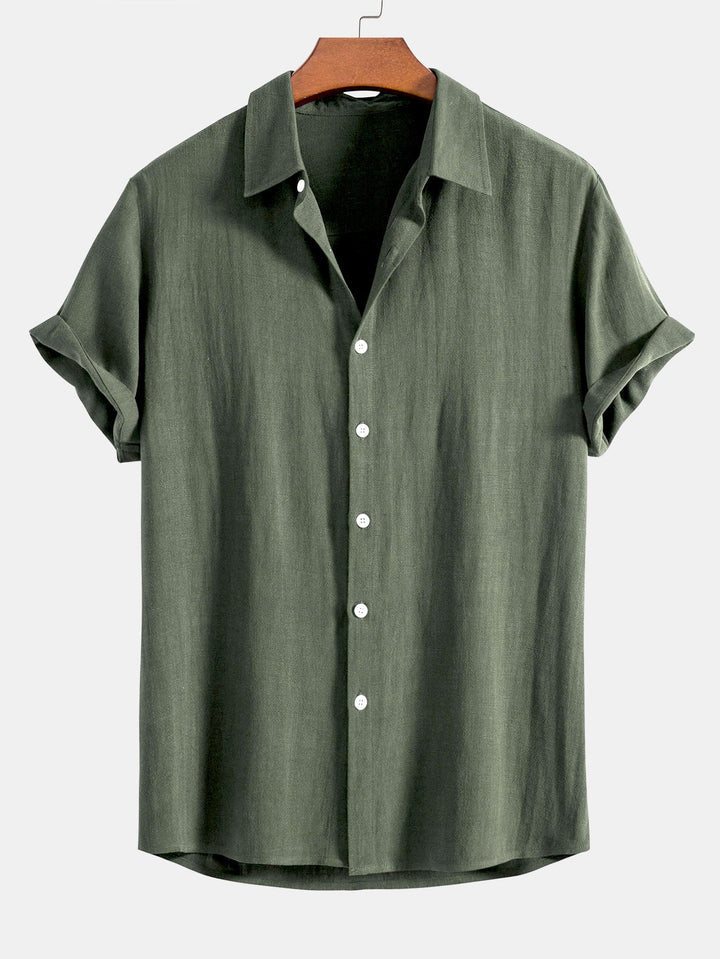 Dunkelblauer Stoff in einer eleganten Falte, unterstreicht die Haptik und Qualität des Materials.