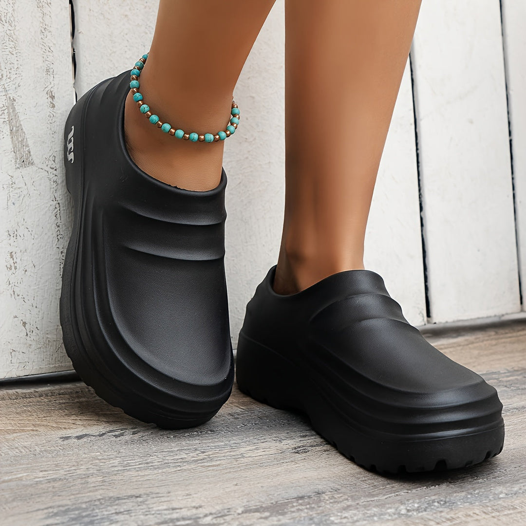 Strapazierfähige AquaStep Arbeitsschuhe: Wasserdichte Unisex Clogs mit orthopädischem Fußbett. Maximale Fußgesundheit.