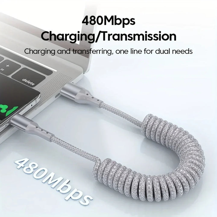 Flexibles 100W USB-C Federkabel für schnelles Laden von Smartphones. Kein Kabelgewirr mehr.
