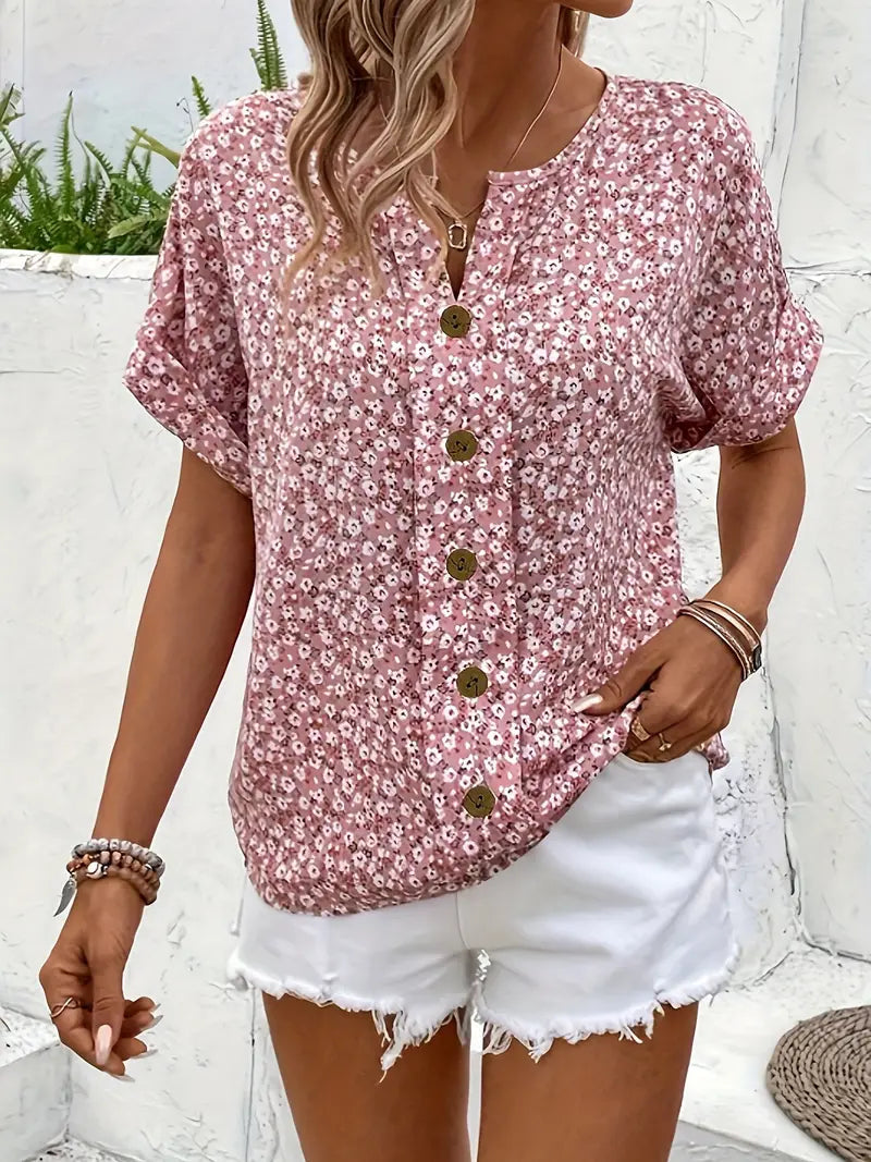 Leichtes Damen Sommer Top mit luftigem Blumenprint, kurzen Ärmeln und praktischer Knopfleiste. Bequem.
