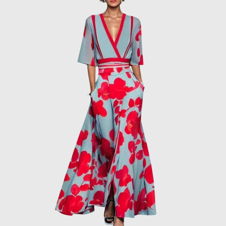 Schmeichelhaftes Damen Wickel-Maxikleid mit elegantem Blumenmuster & V-Ausschnitt. Fließendes Sommerkleid.