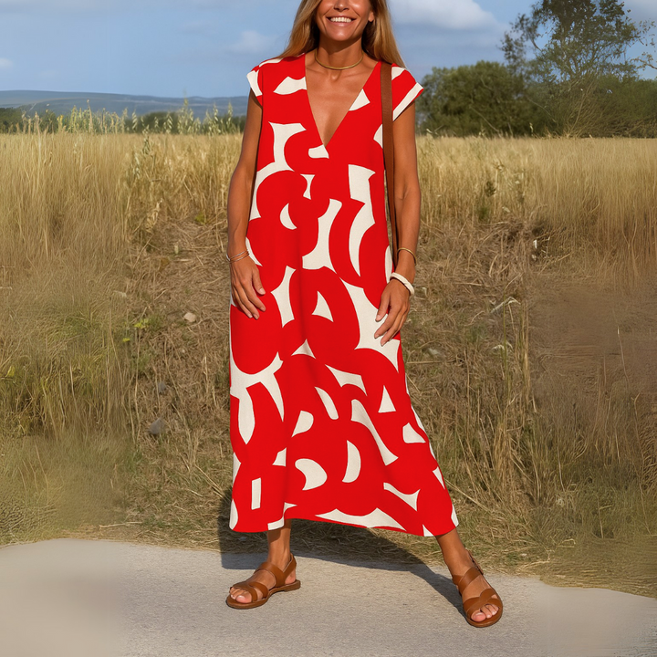 Fließendes Damen Sommerkleid mit V-Ausschnitt, stilvoll und leicht. Perfektes Freizeitkleid für einen entspannten Sommerlook.
