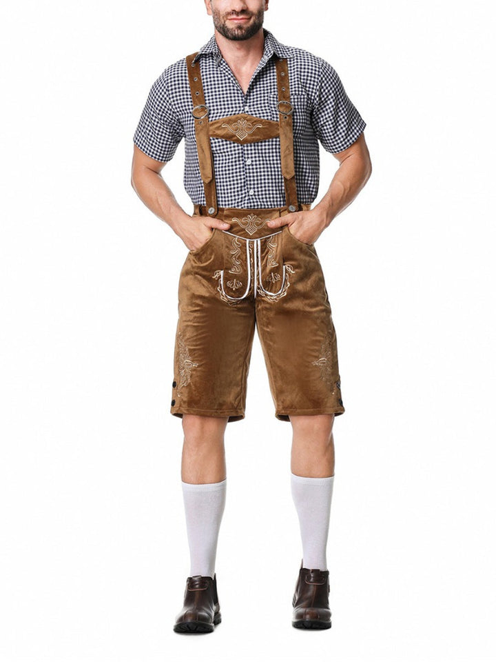 Komplettes Herren Trachten-Outfit: Schwarze Lederhosen, rotes kariertes Hemd, bestickte Hosenträger.