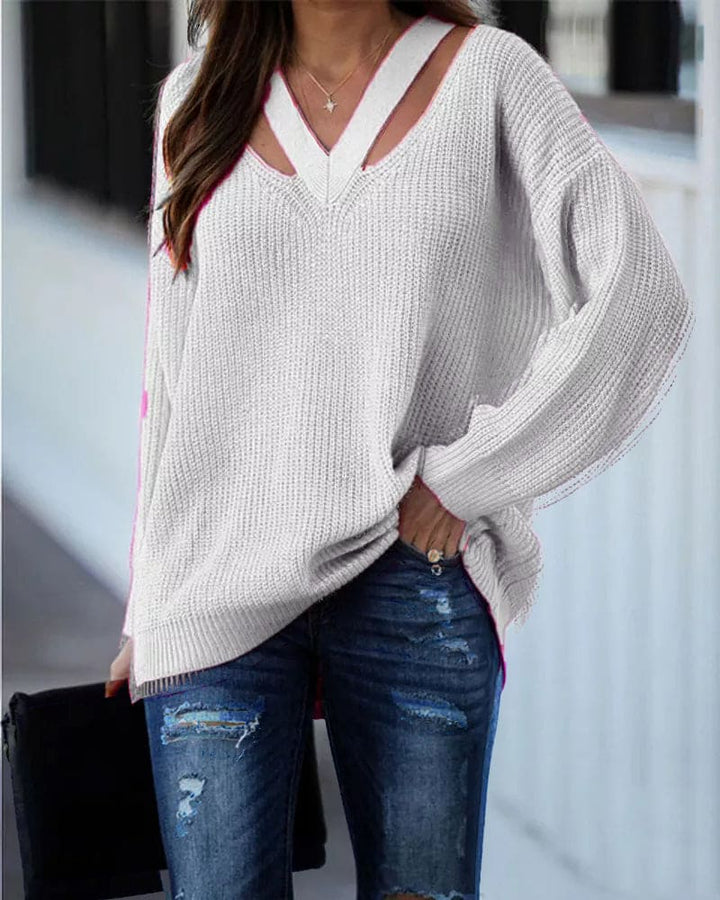 Gemütlicher Damen Pullover mit V-Ausschnitt. Langer Schnitt für Komfort und Wärme im Herbst.
