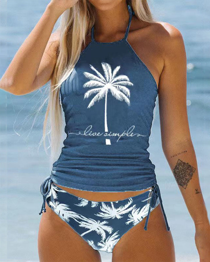 Damen Beachwear Tankini Set mit tropischem Palmenmuster und Neckholder-Top für den Sommer.
