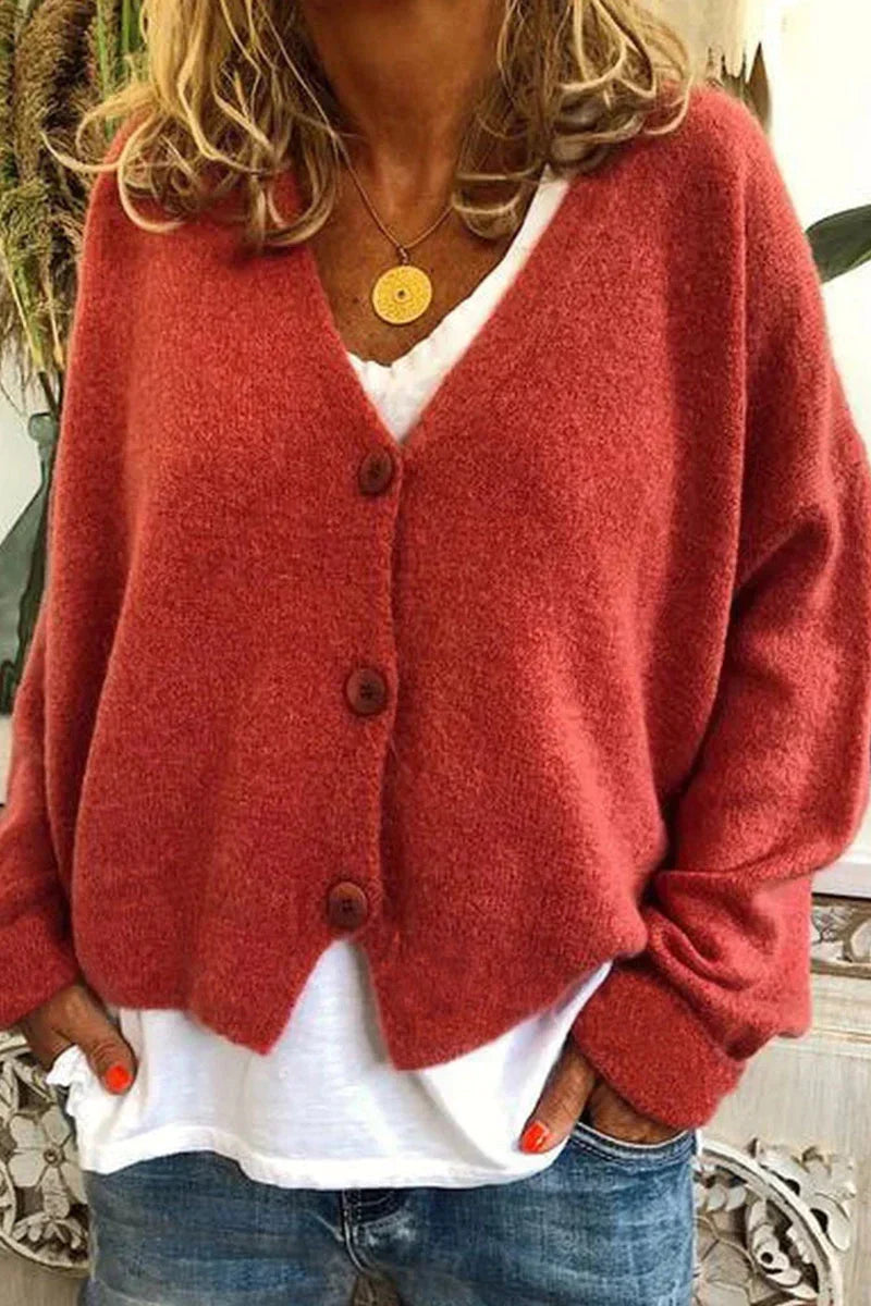 Einfarbige Damen Strickweste V-Ausschnitt. Klassisches Oberteil, ideal für Layering im Herbst/Winter.