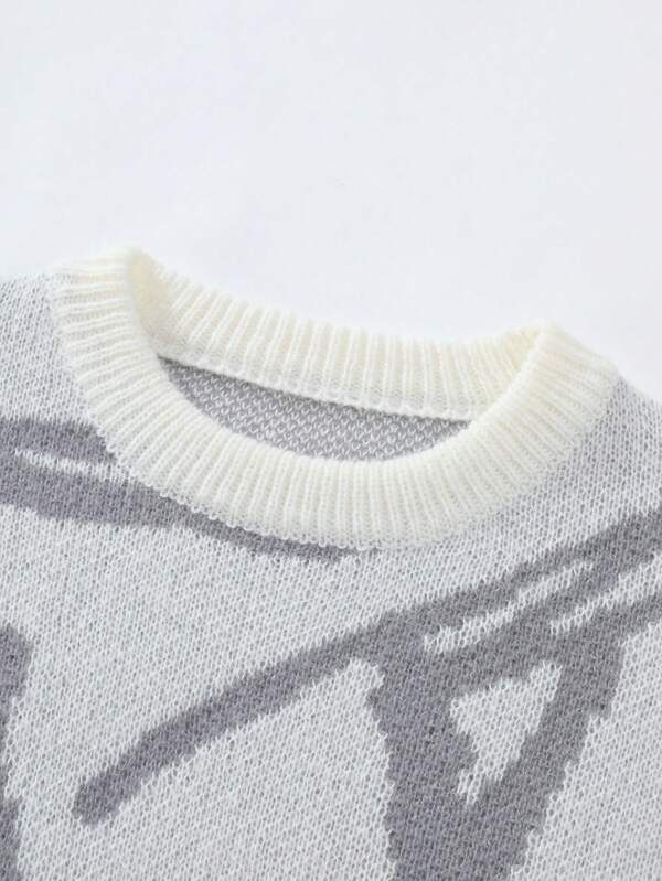 Oversize Herrenpullover Arvid, grafisch bedruckt, ein lässiges Oberteil für die kalte Jahreszeit.
