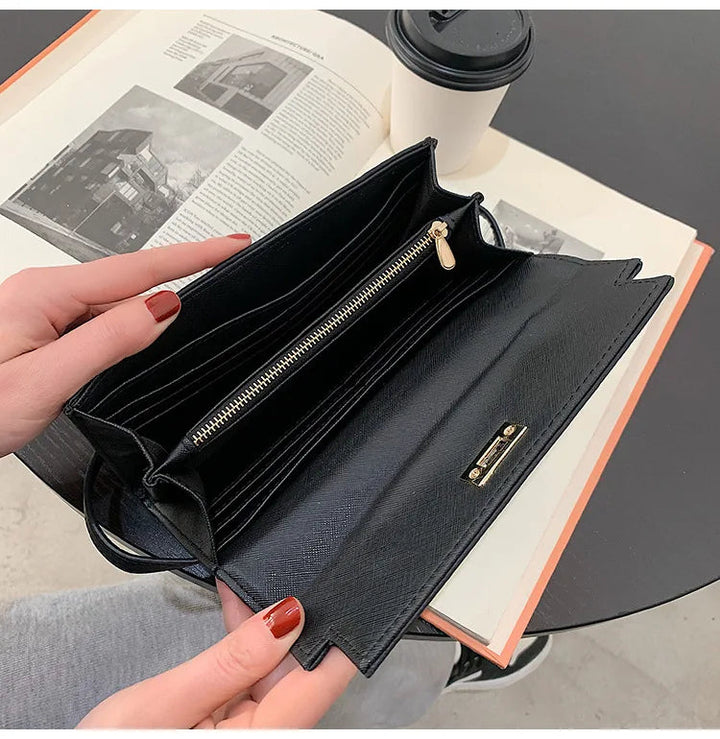 Damen Accessoire: Elegante Brieftasche mit sicherem Druckknopfverschluss. Stilvoll, praktisch & ideal für jede Handtasche.