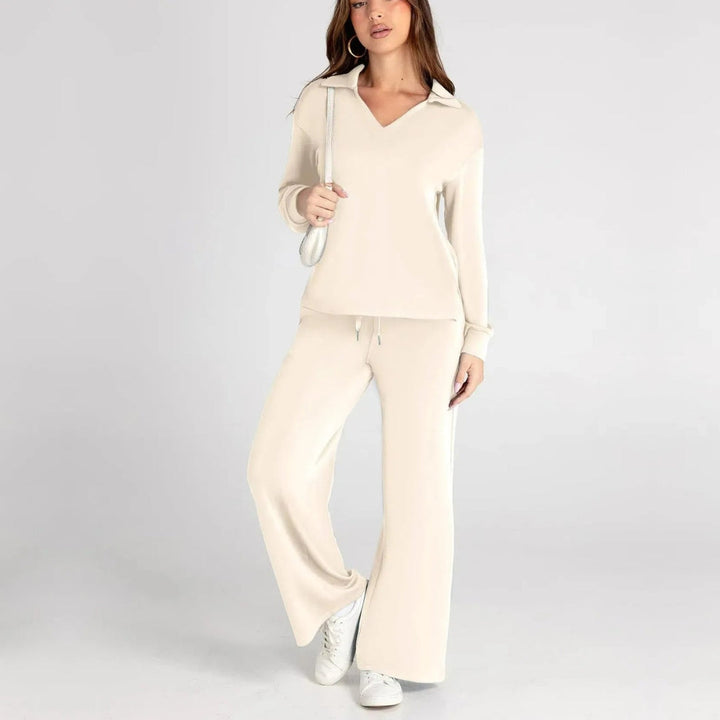 Damenmode: Entspannter V-Ausschnitt Pullover & weite Hose als stilvoller Hausanzug.