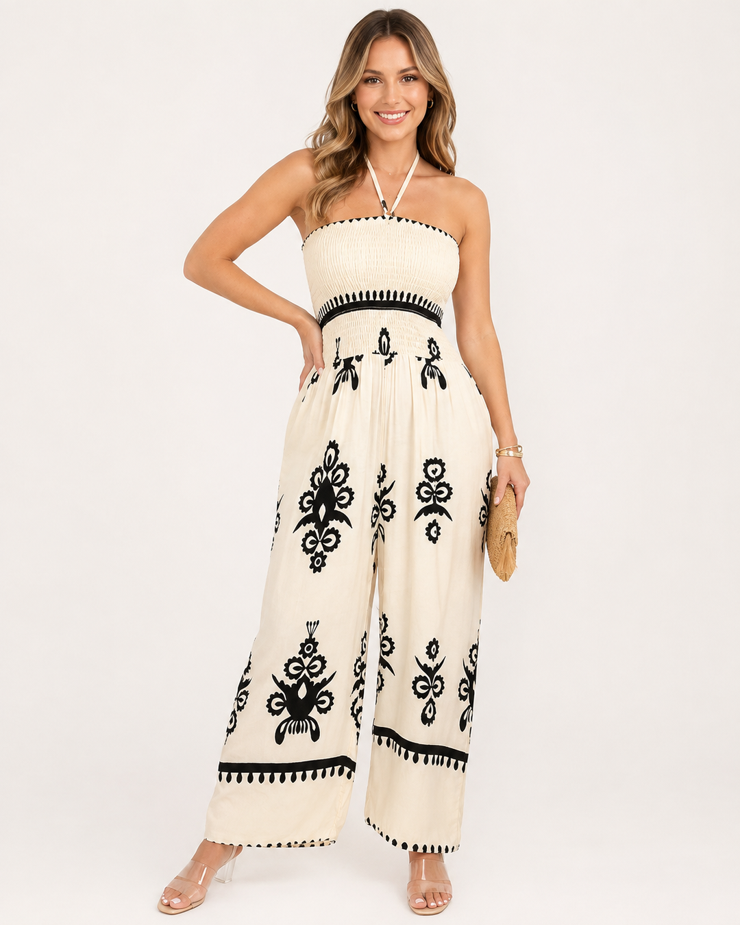 Eleganter Damen Trägerloser Jumpsuit mit Blumenprint & weitem Bein. Perfekt für Sommer, Strand & Party.