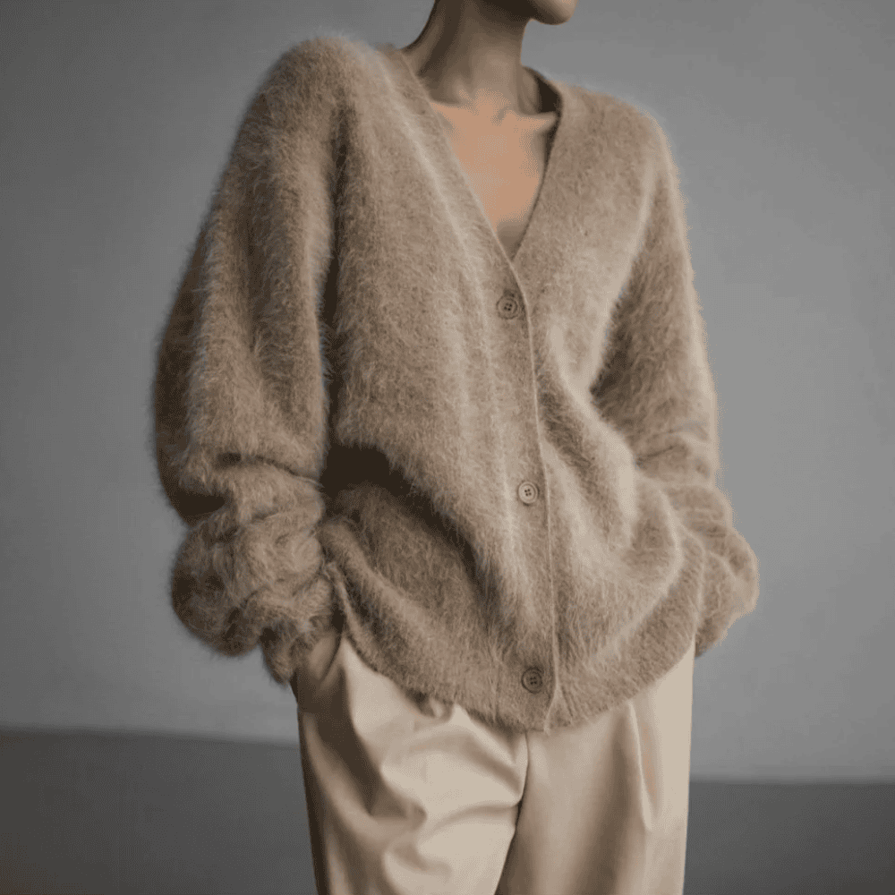 Elegante Damen Couture Strickjacke für stilvolle Auftritte. Luxuriöses Design, perfekt für Business & Freizeit.