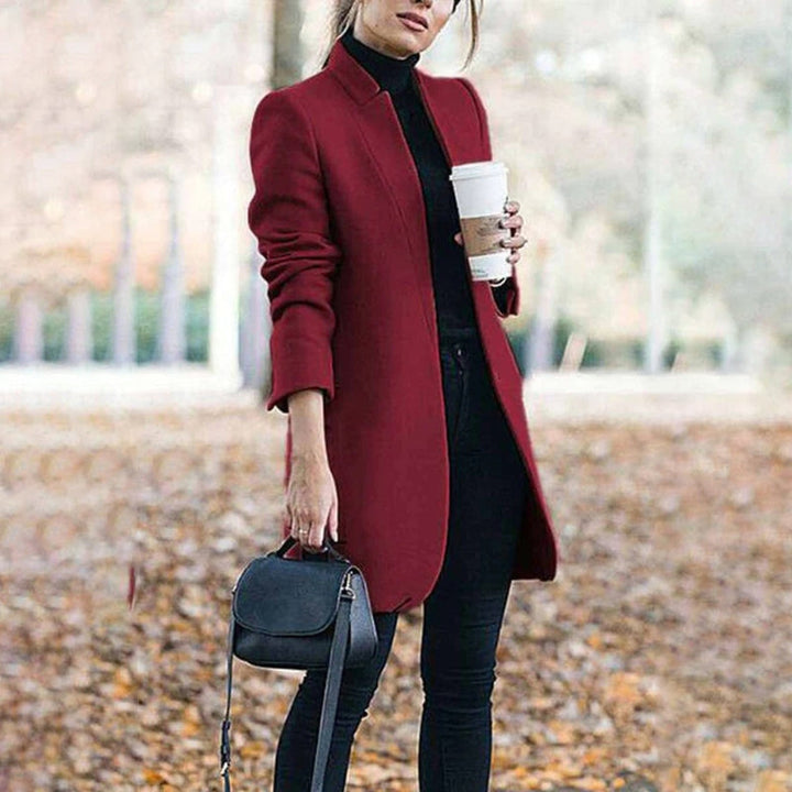 Damen Oberbekleidung: Eleganter Langmantel mit Reverskragen, tailliert, für Herbst & Winter Mode.
