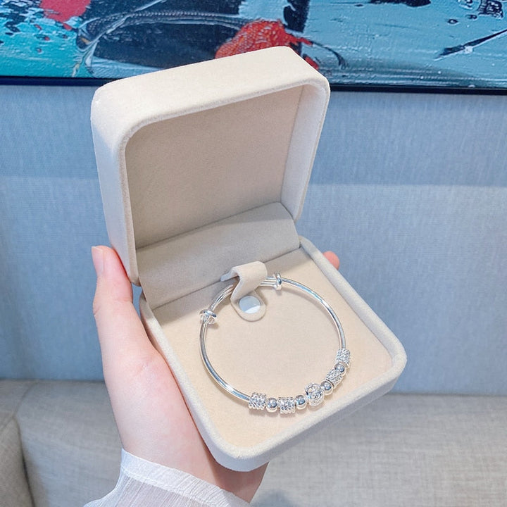 Damen 925 Silber Armband mit eleganten Glücksperlen. Hypoallergener Damenschmuck, zeitloses Accessoire.