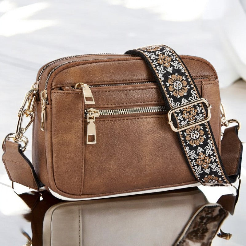 Praktische Damen-Alltagstasche aus robustem Leder. Moderne Schultertasche mit viel Platz für tägliche Essentials.