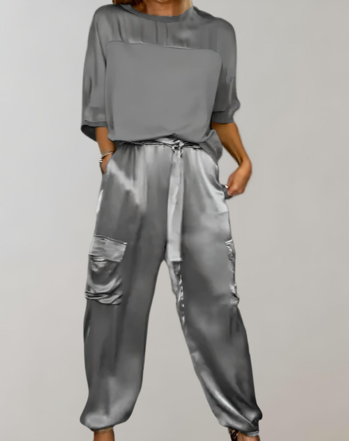 Hochwertiges Damen 2-teiliges Set Design: 3/4-Ärmel Oberteil & schmeichelnde Hose für stilvolle Frauen.