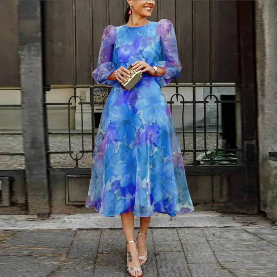 Sommerliches Blumen Midikleid für Damen, elegant und fließend, ideal als Hochzeitsgast-Outfit oder Abendmode.