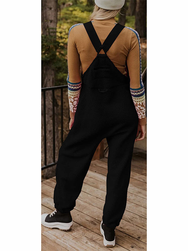 Damen Fleece Jumpsuit, warm, mit Reißverschlusstaschen für Winteraktivitäten.