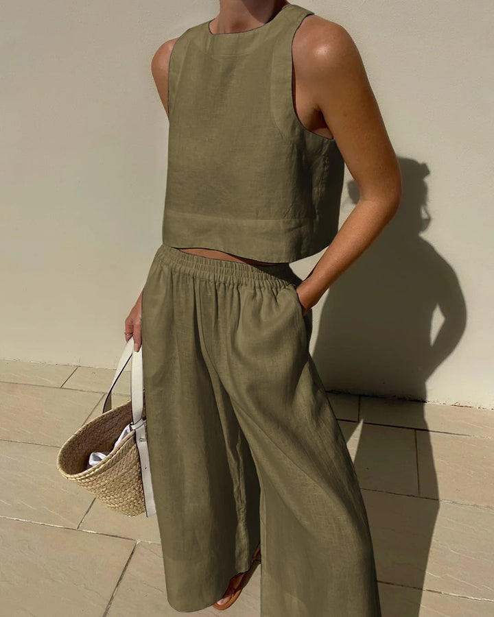 Fließendes Damen Leinen-Set in Naturfarbe: Zweiteiler mit Crop-Top & weiter Hose, locker geschnitten.