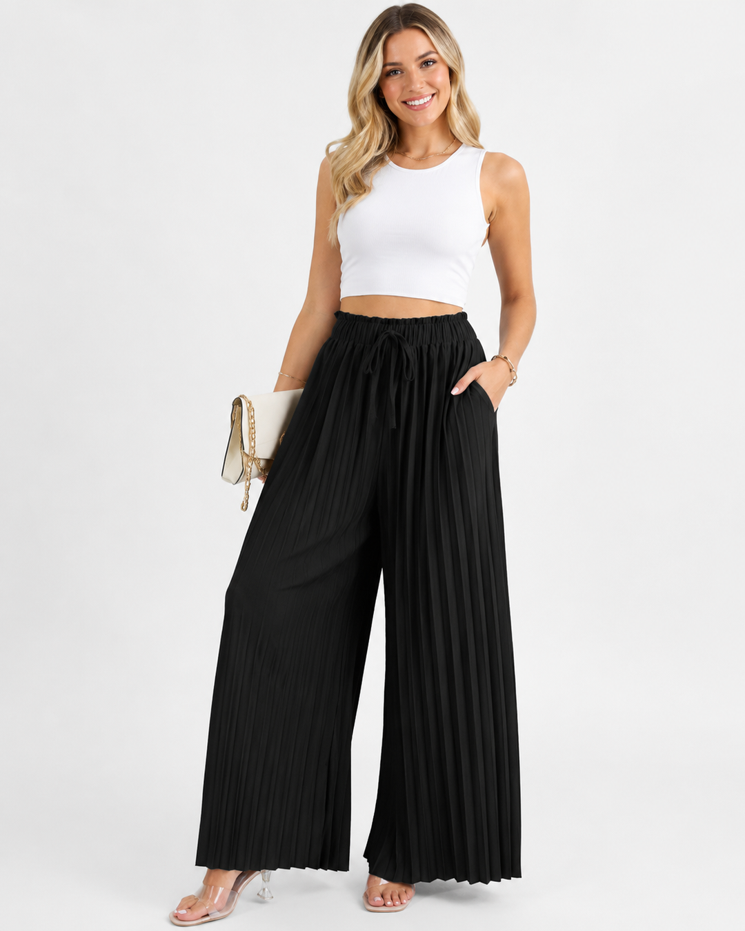 Elegante Damen Plisseehose mit weitem Bein, luftig und bequem für den Sommer. Perfekt für modebewusste Frauen.
