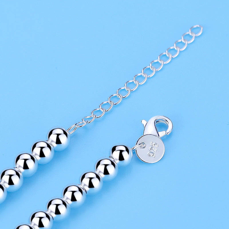 Modisches Damen Perlen-Herz-Armband aus 925 Sterling Silber mit blauem Emaille, elegante Geschenkidee.