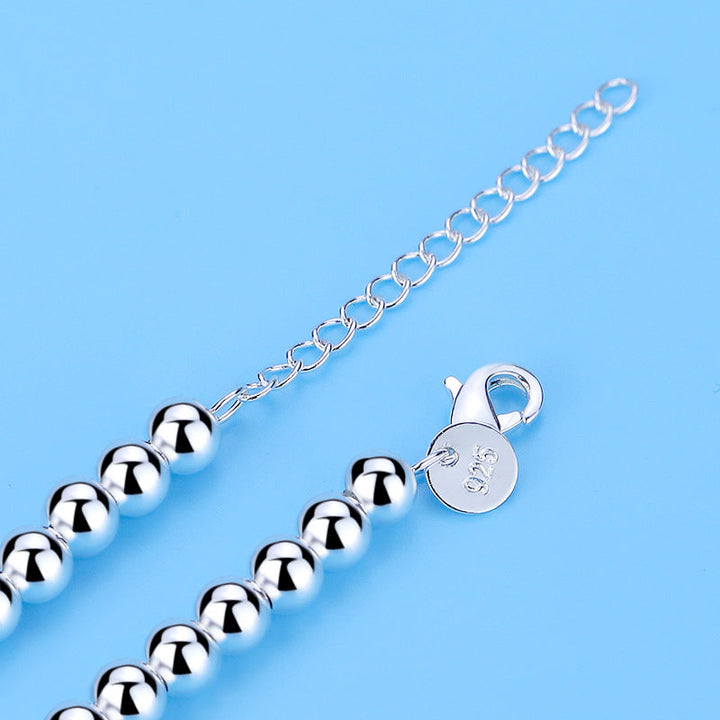 Modisches Damen Perlen-Herz-Armband aus 925 Sterling Silber mit blauem Emaille, elegante Geschenkidee.