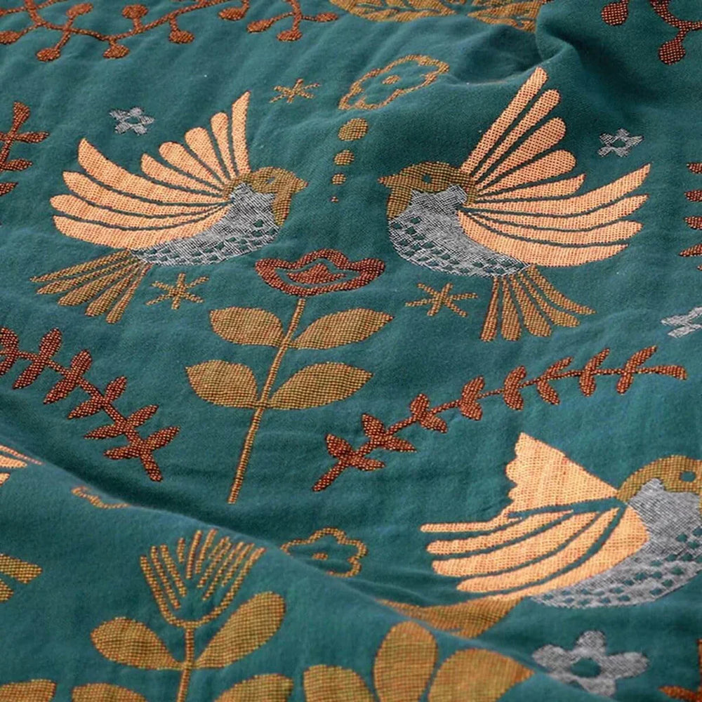 Gemütliche Sofadecke mit elegantem Vogelmotiv, skandinavischem Design für Ihr Wohnzimmer.