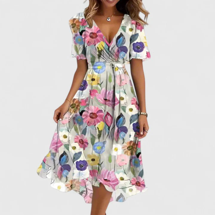 Detail: Feminines Blumenmuster auf luftigem Damen Sommer Midi-Kleid. Ideal für festliche Anlässe.