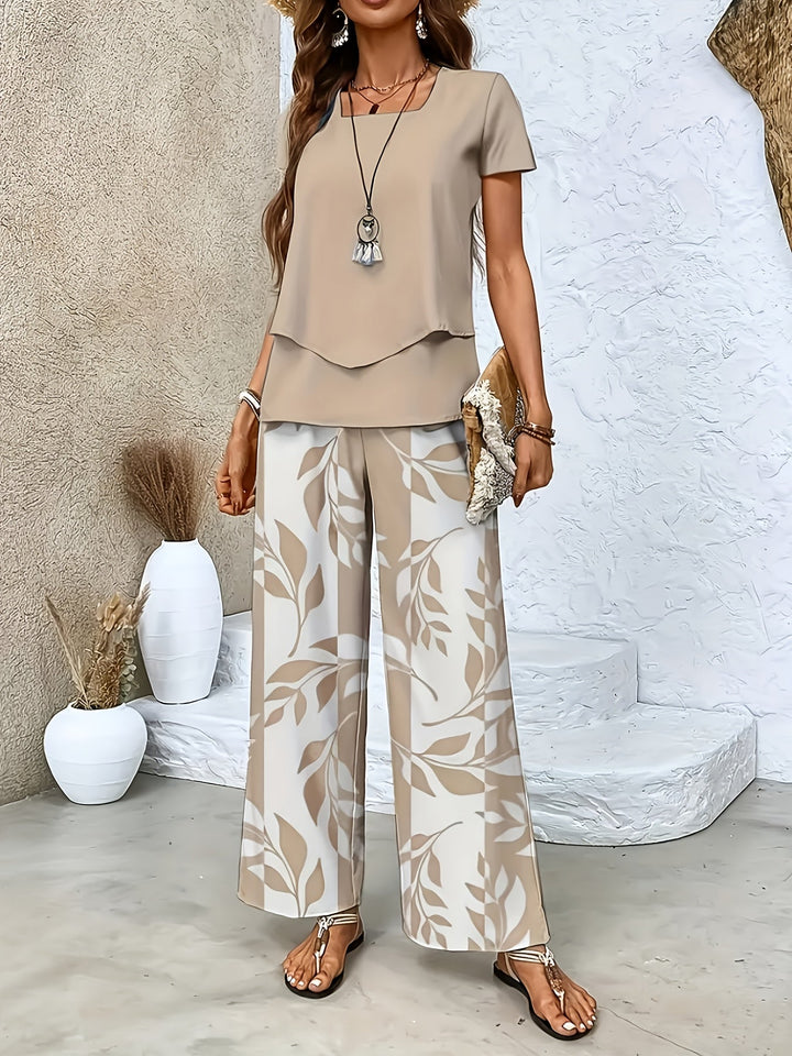 Modernes Damen Zweiteiler Set: Weite Sommerhose & Kurzarmshirt, ideal für entspannte Tage & Abende.