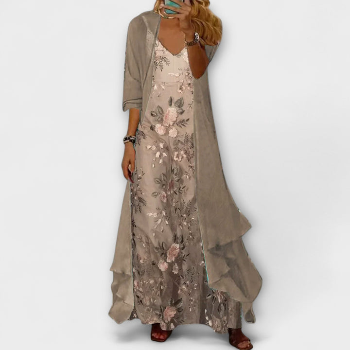 Elegantes Damen Maxikleid mit floralem Blumenmuster, V-Ausschnitt & Lagen-Optik. Ideal als Sommer- oder Freizeitkleid.