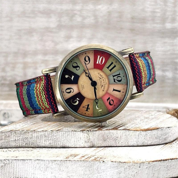 Modische Damenuhr Elyvra mit Regenbogenmuster und elegantem geflochtenem PU-Lederarmband.