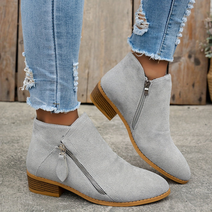 Bequeme Damen Stiefeletten mit Fußunterstützung, perfekt für lange Spaziergänge und gesunde Füße.