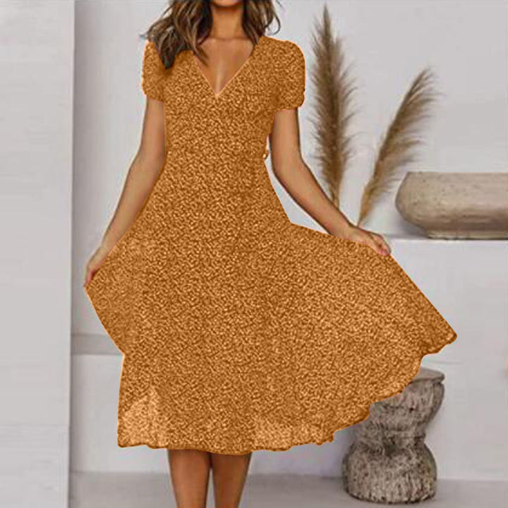 Elegantes A-Linien Midikleid für Damen mit V-Ausschnitt, ideal als Freizeit- oder Partykleid.