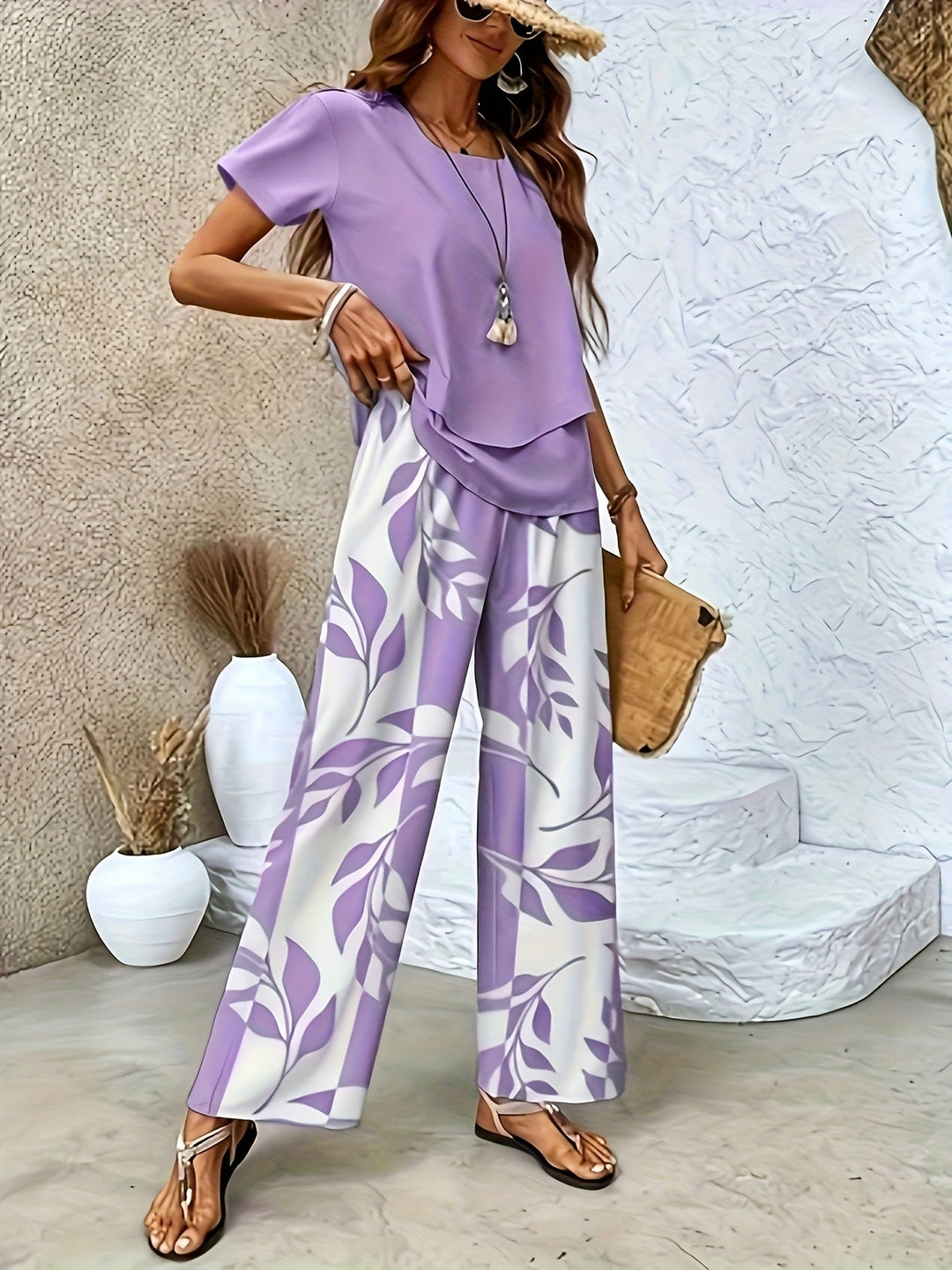 Damen Sommer Set elegant: Zweiteiler mit weiten Hosen & luftigem Kurzarmshirt für stilvolle Freizeit.