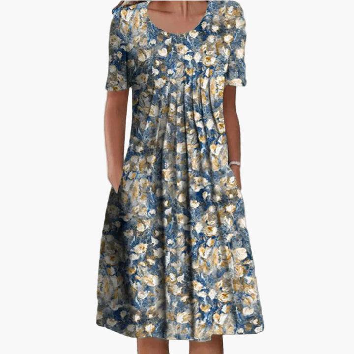 Stilvolles Damen Sommerkleid mit Blumenmuster. Elegantes, langes Freizeit- und Urlaubskleid, luftig und bequem.