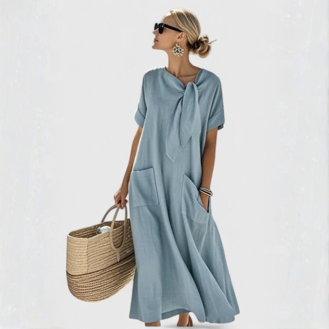 Lockeres Damen Midikleid mit elegantem Bindekragen, praktischen Taschen. Perfekt als bequemes Sommer- oder Freizeitkleid.