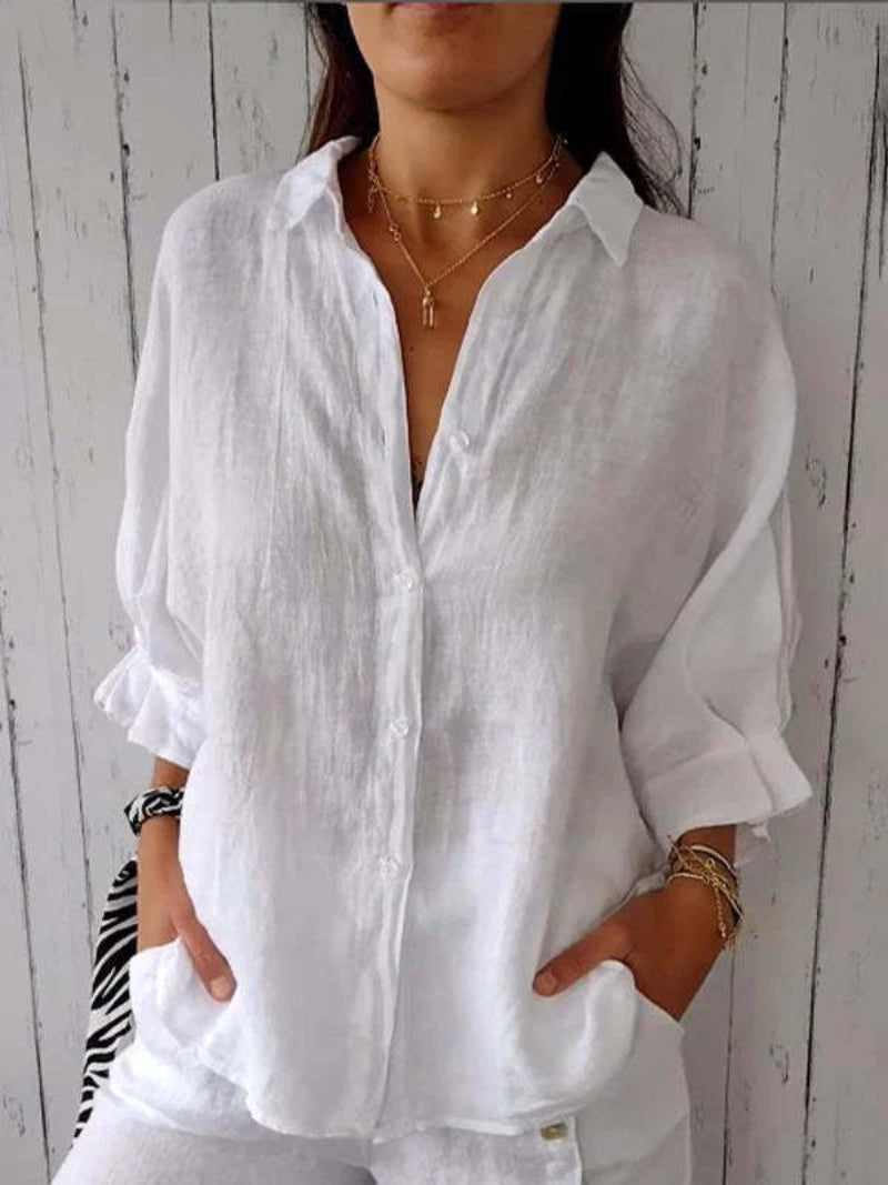 Vielseitige Oversize Bluse für Damen. Lockere Sommerbluse mit einzigartigem Rückendetail, ideal für Freizeit.