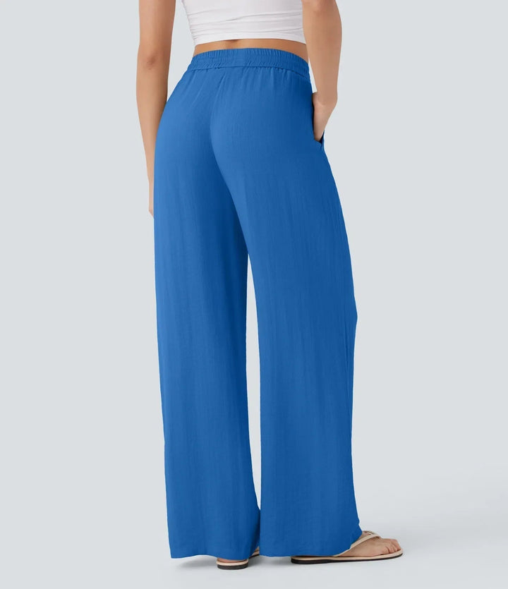 Marineblaue Damenhose, weites Bein. Stylisch & bequem, ein echtes Wohlfühlstück für den Sommer.