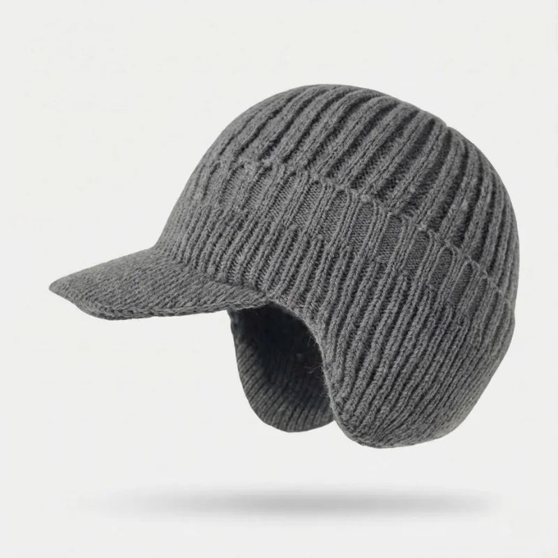 Kuschelige Unisex Wintermütze mit Ohrenklappen, thermisch isolierend, hält Kopf & Ohren warm.