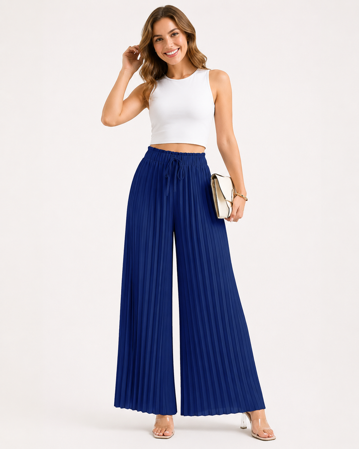 Moderne Damen Weite Hose mit feinen Plisseefalten. Eine stylische und komfortable Wahl für warme Sommertage.