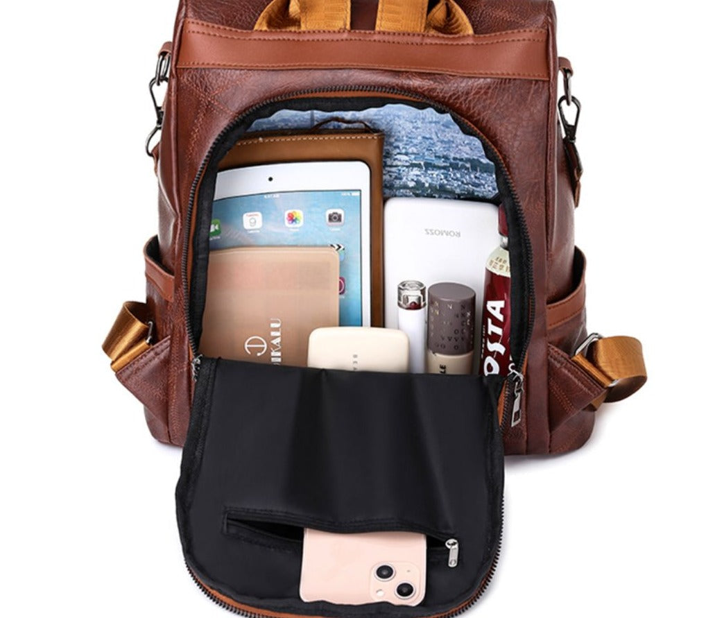 Praktischer & eleganter Reise-Rucksack für Damen, aus veganem Leder in stilvoller Braun-Optik.
