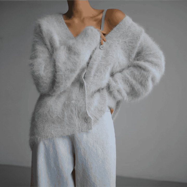 Hochwertige Damen Couture Cardigan. Edles Strick-Oberteil, das Eleganz und Luxus in jedem Outfit betont.