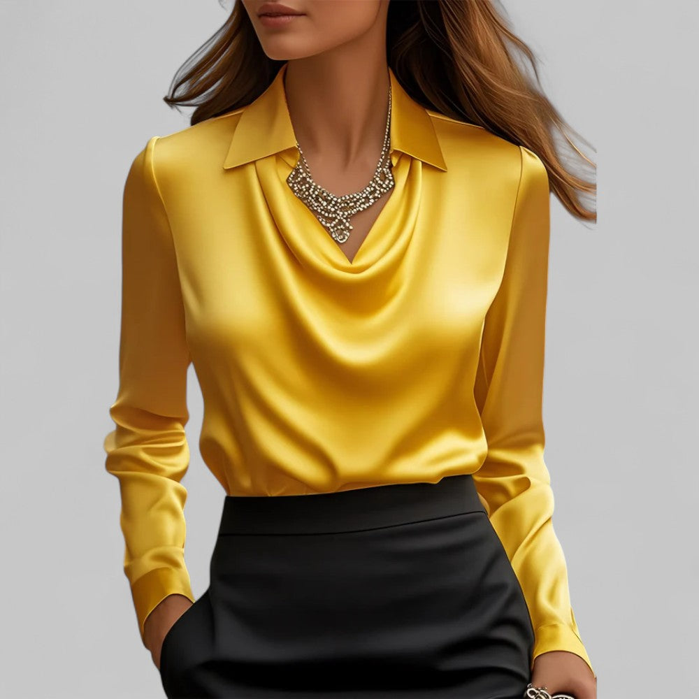 Fashion-Statement: Elegante Damen Bluse mit Wasserfallausschnitt. Stilvolles Langarm Oberteil für Frauenmode.