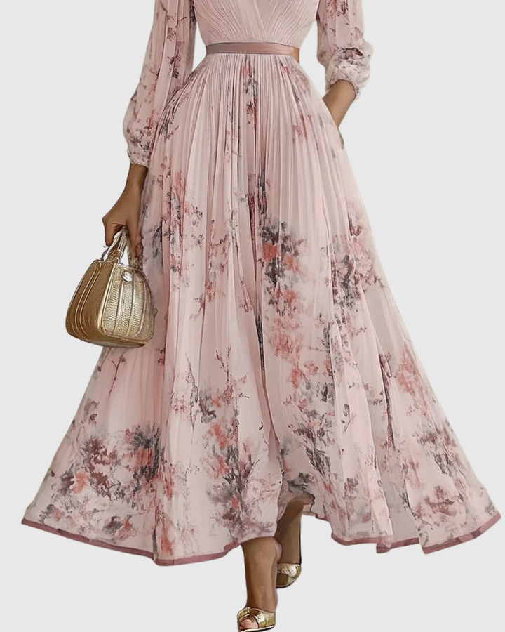 Modisches ärmelloses Plissee Blumen Midi-Kleid für Damen. Ideal als Sommer-Partykleid.