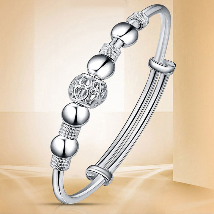 Elegantes Damen Silberarmband, 925er Sterlingsilber mit polierten Glücksperlen. Zeitloser Schmuck für Frauen.