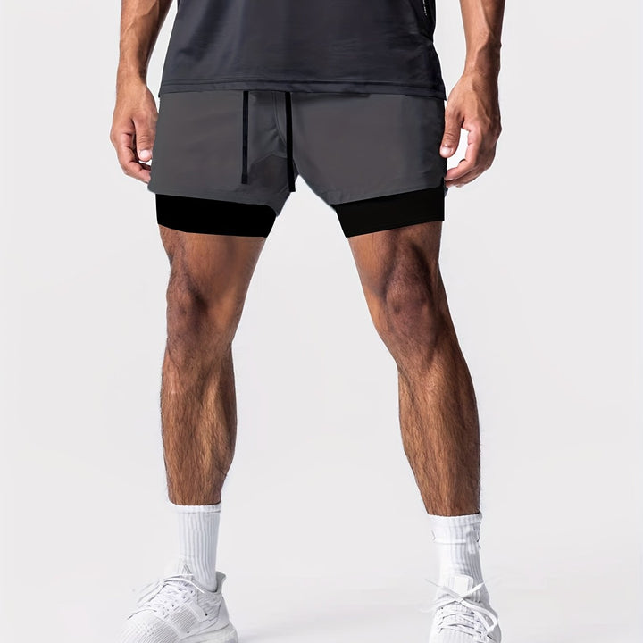 Graue Herren 2-in-1 Performance Shorts, ideal für Laufen, Fitness & Workout. Atmungsaktiv & leicht.