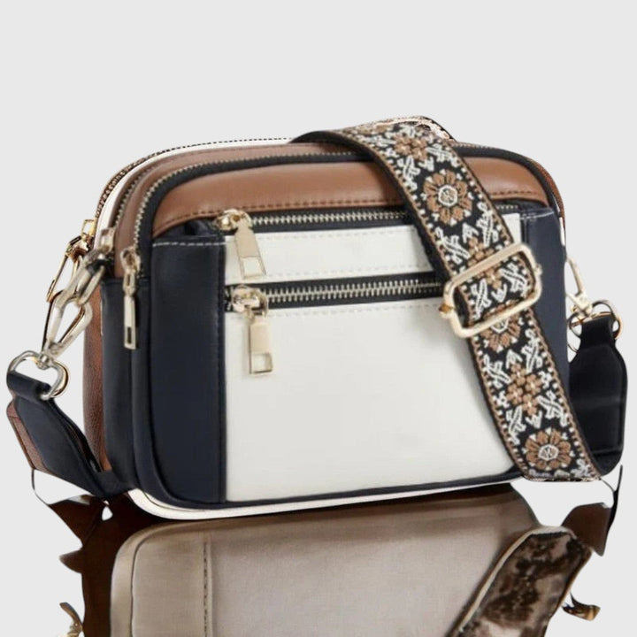 Modische Damen Handtasche mit abnehmbarem Blumenriemen. Geräumig & organisiert, ideal als Schultertasche.