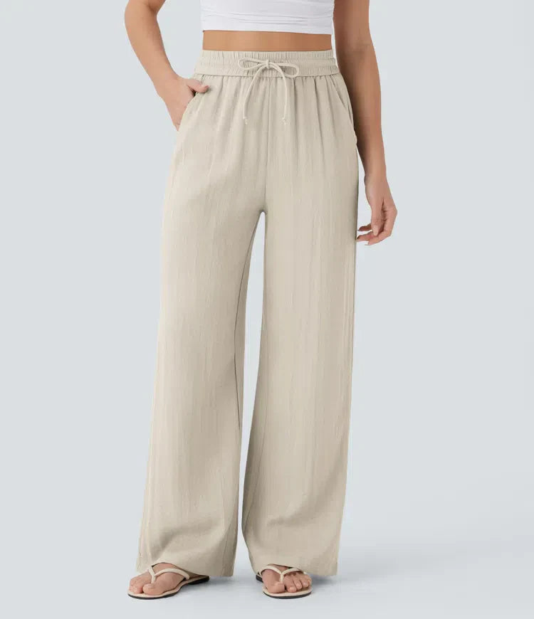 Elegante Damen Sommerhose mit weitem Bein in Beige. Perfekt für luftige Casual-Looks & Urlaub.