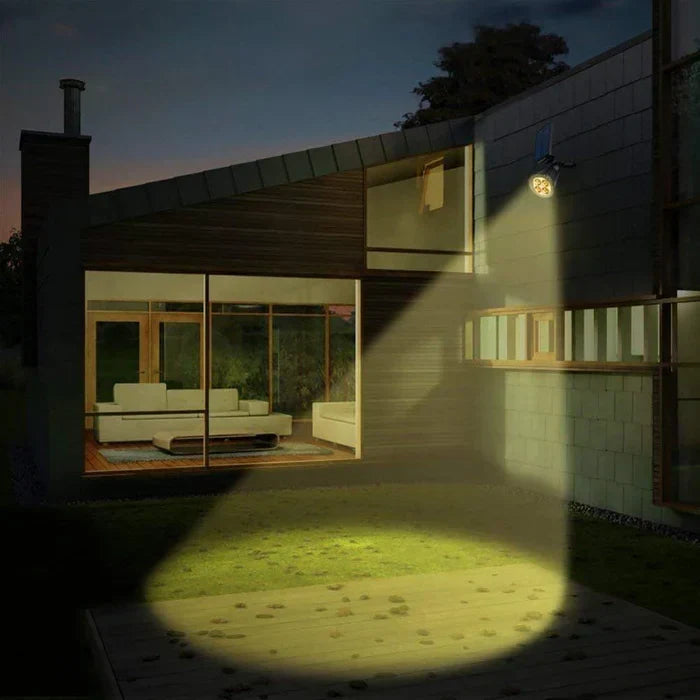 Eleganter Solar-Garten-Spotlight mit Erdspieß. Ideal für akzentuierte Beleuchtung von Blumenbeeten.