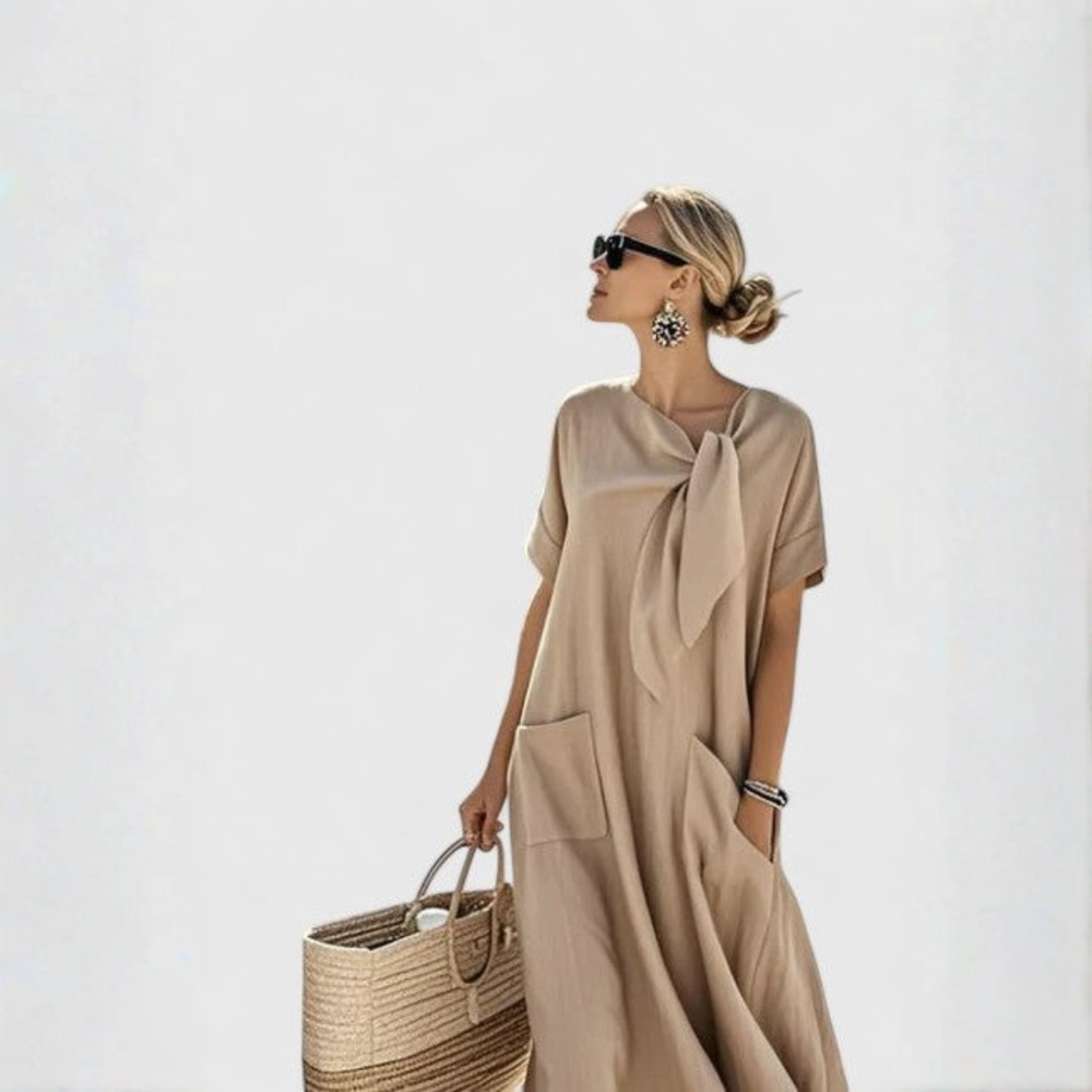 Elegantes Damen Sommer Midikleid mit Bindekragen. Fließendes Design, lockere Passform für Urlaub oder festliche Anlässe.